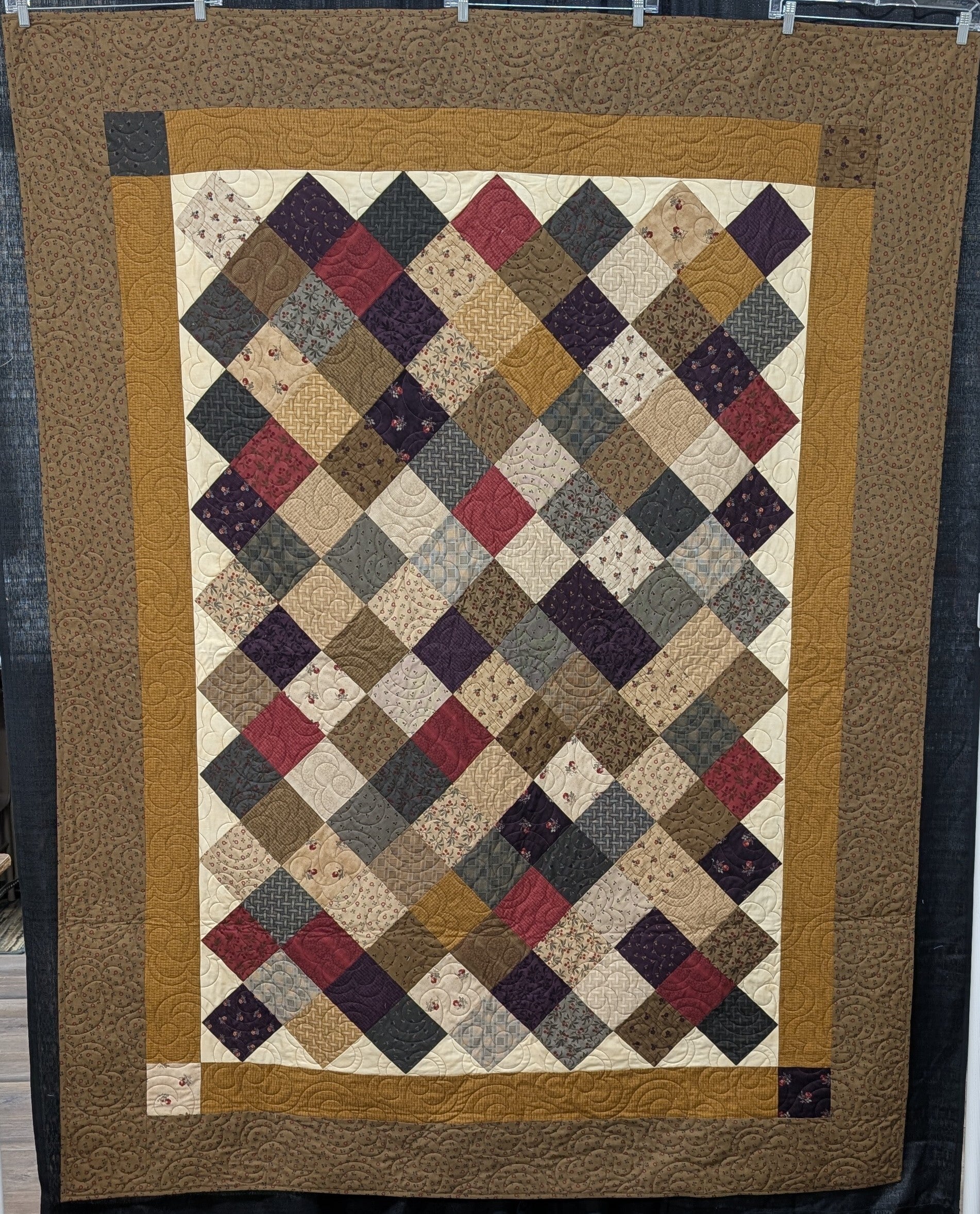 A Charming Quilt Earth Tones Finished Item Size: 64" x 82"